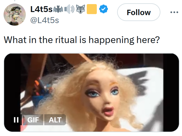 Tweet reading "What in the ritual is happening here?" Below is a gif of a messed up Barbie doll.