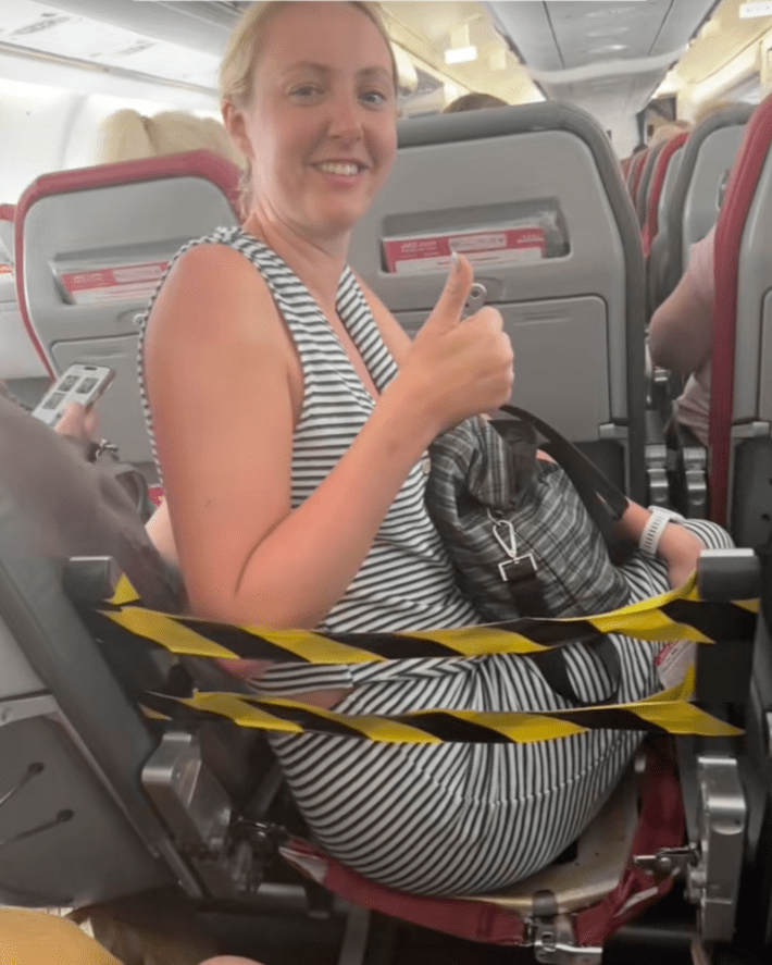A video of @charlotteoandr’s seat on a Jet2 flight went viral with 32 million views back in April. The TikTok creator shared images of herself on a makeshift seat in the middle of a completely packed flight.