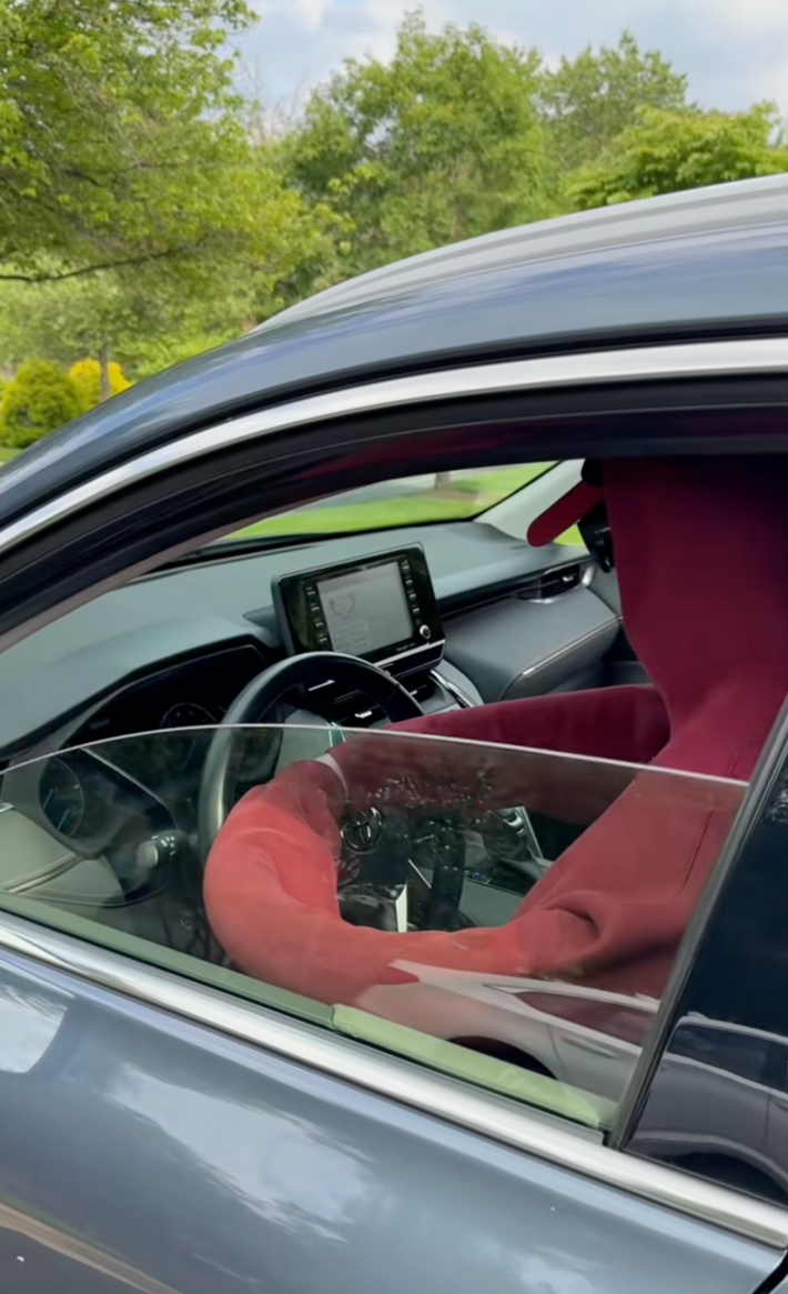 homemade mannequin in car driver seat