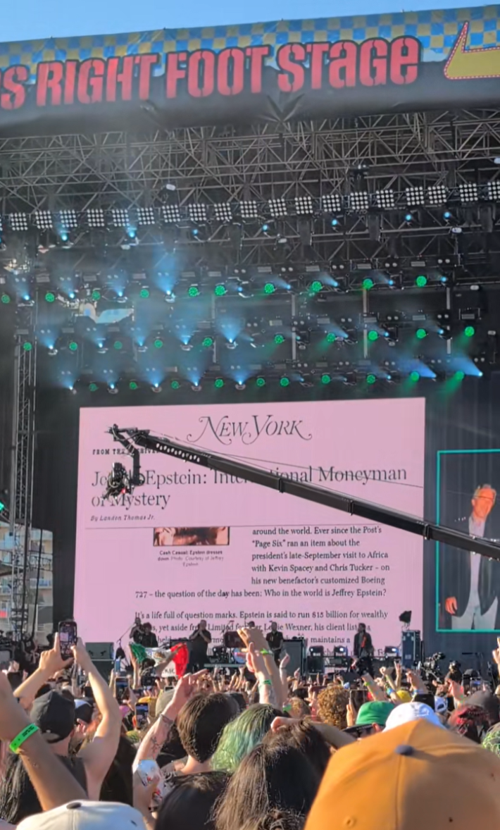 TikTok video of the Dropkick Murphys performing "First Class Loser" with the New York Magazine article on the screen behind them.