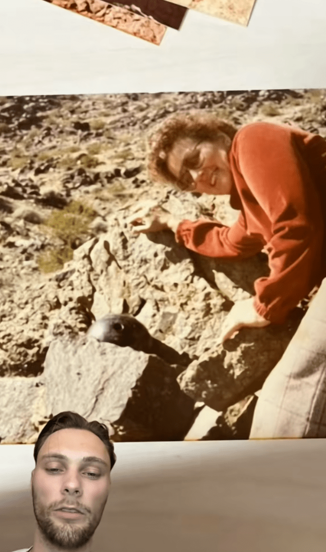 Old photo of an older woman next to the bowling ball.