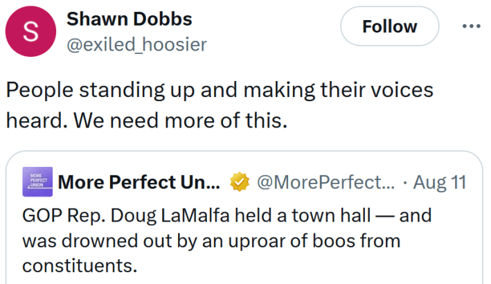 Tweet reading "People standing up and making their voices heard. We need more of this."