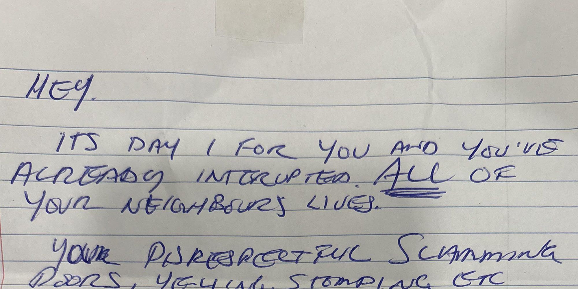 Handwritten note on lined paper in all capitals reading, "Hey. Its day 1 for you and you've already interrupted ALL of your neighbor's lives."
