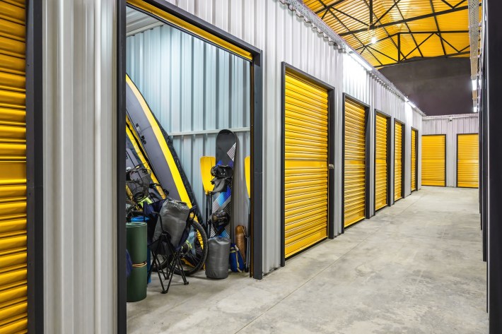 Corridor of self storage unit with yellow doors