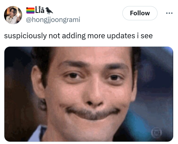 Tweet that reads, "suspiciously not adding more updates i see" with a photo of a man with a moustache desperately trying not to laugh.
