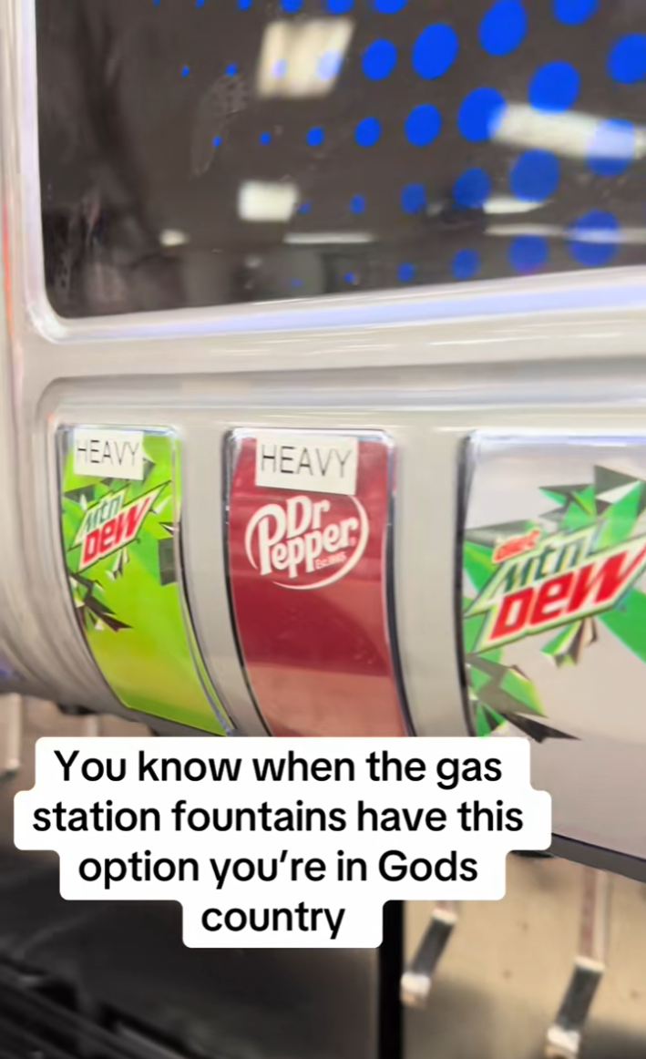 An image of a soda foundain with "heavy" labels on some of the soda options.