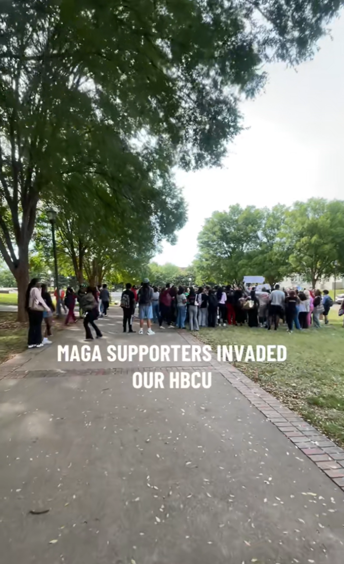 A crowd near a walking path surrounding MAGA supporters. Text overlay reads, "MAGA supporters invaded our HBCU."