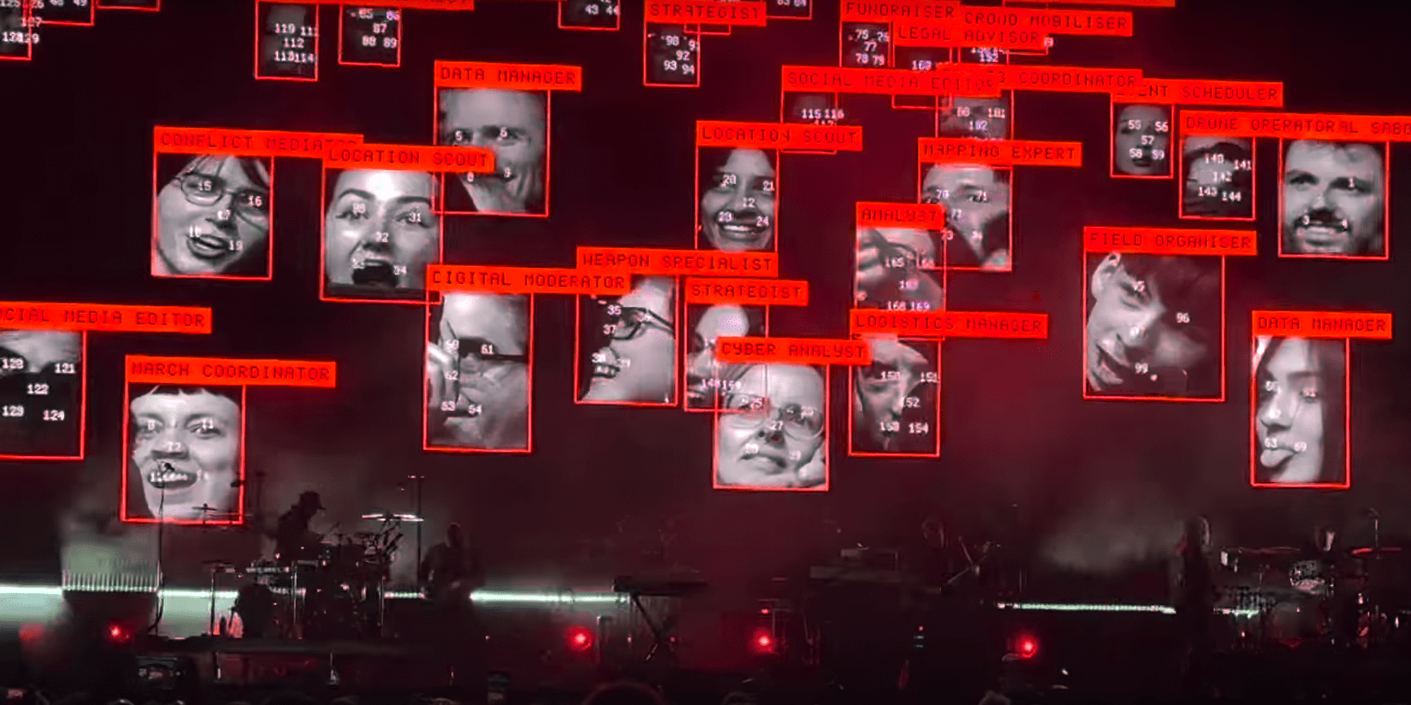 massive attack playing in front of the faces of its crowd