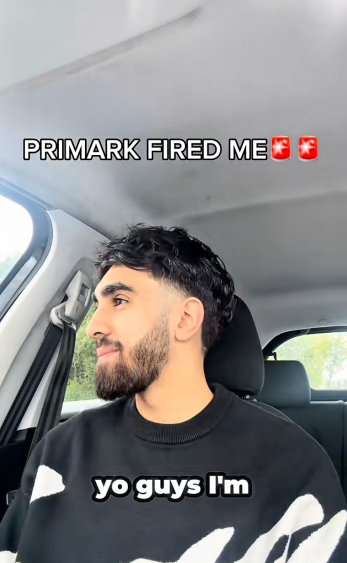 Text overlay reads, "Primark fired me" in all caps. A man is looking out his car window in disbelief.