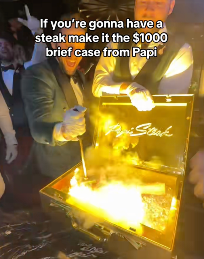 papi's beef case steak with onscreen text: if youre gonna have a steak make it the $1000 brief case from papi