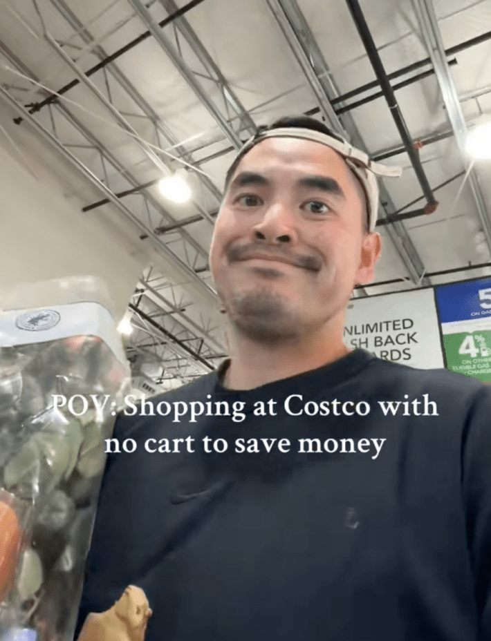 @the.hoang.family/TikTok shopping at costco without a cart - huang shopping at the store with onscreen text "POV: shopping at Costco with no cart to save money."