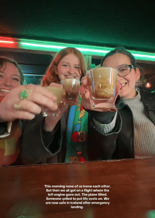 TikTok video of three woman toasting shots in a bar for the camera.