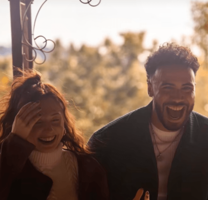 richard and ali smiling post engagement