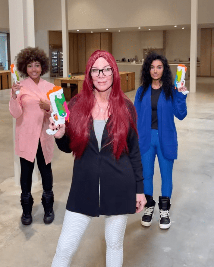 kim, kris and north west in their halloween costume as pink cardigan, jay guapo and chrissy g