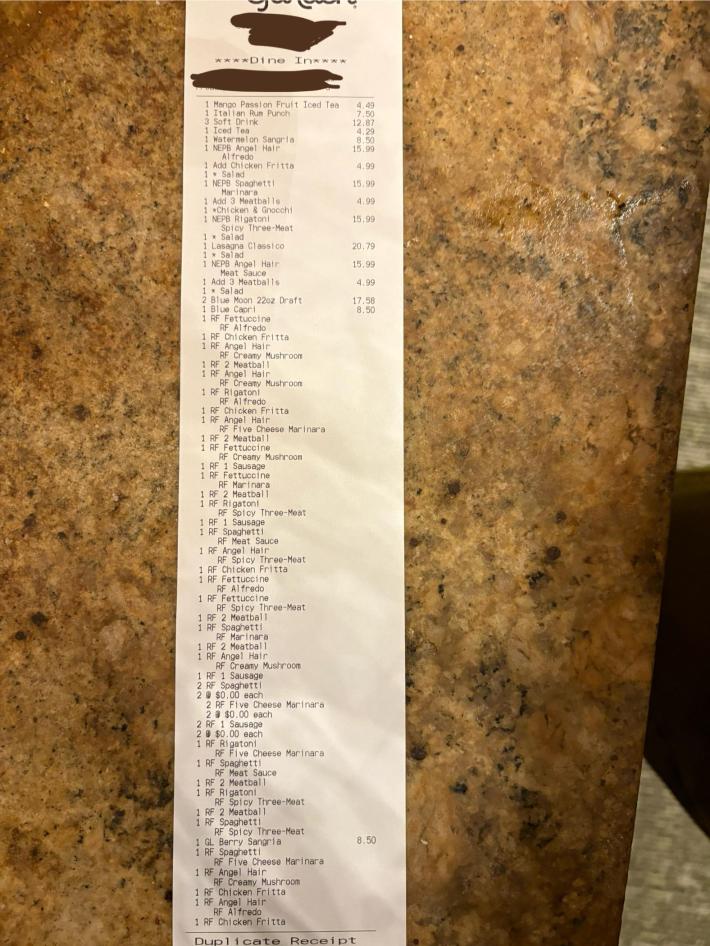 Long Olive Garden receipt filled with free refills of pasta.