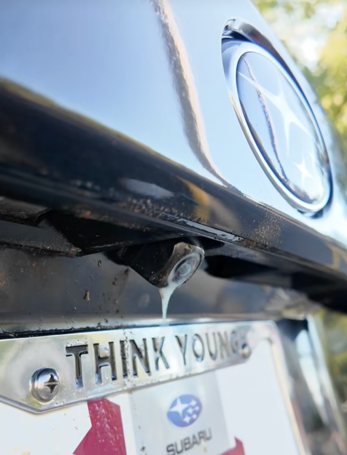 @youngsubaruogden/TikTok demonstrating backup cam cleaner feature in newer subaru models - backup cam washed with wiper fluid from a nozzle