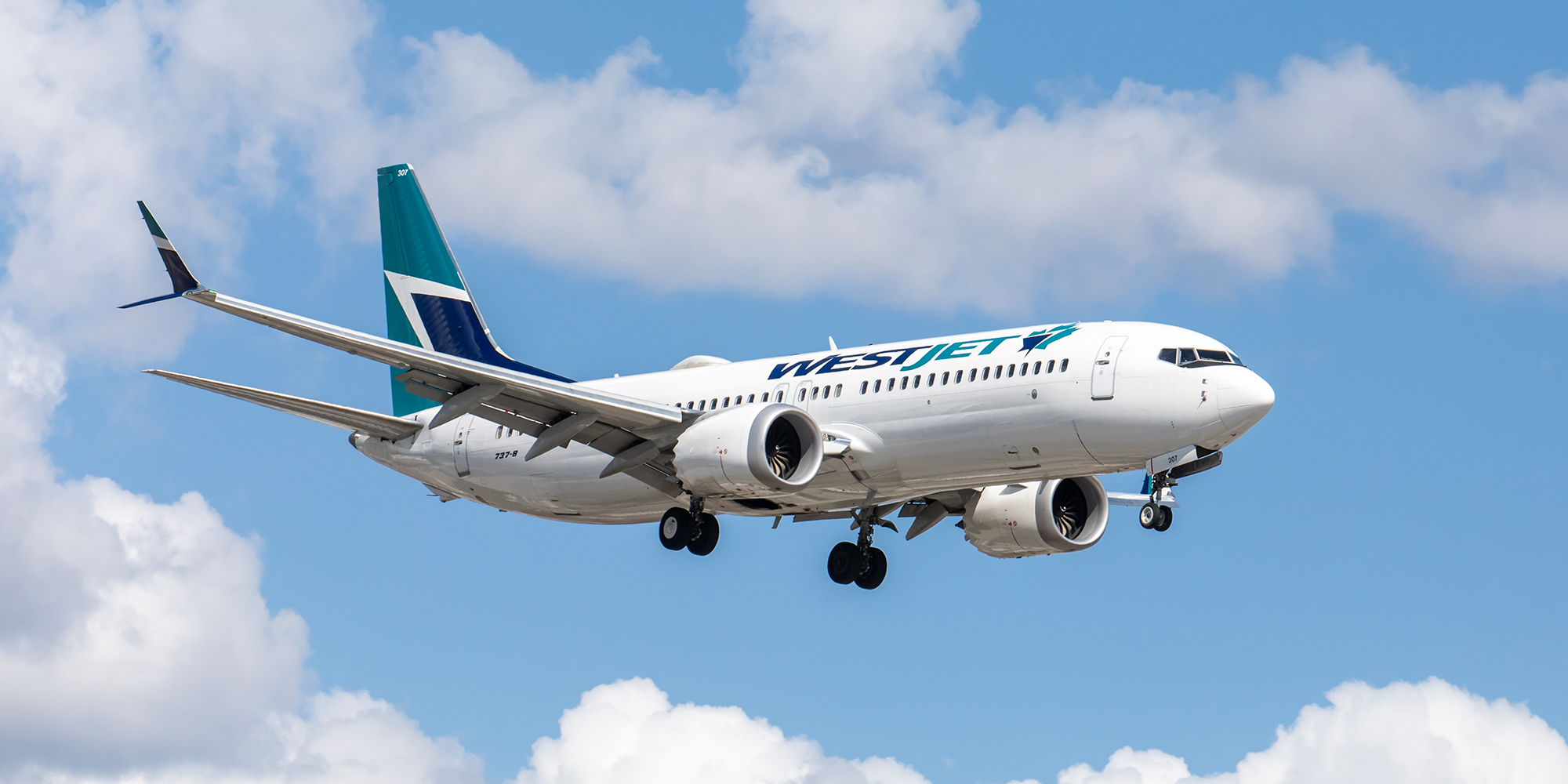 Toronto Canada, June 10, 2022; Quarter view of Westjet Boeing 737 jet airliner arriving for landing at Toronto Pearson airport