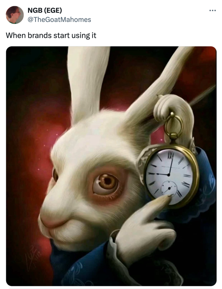 White rabbit pointing at clock meme that reads, "When brands start using it"