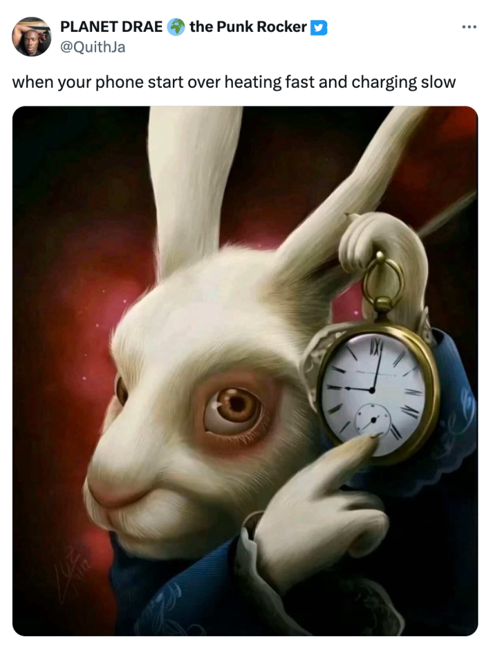 White rabbit pointing at clock meme that reads, "when your phone start over heating fast and charging slow"