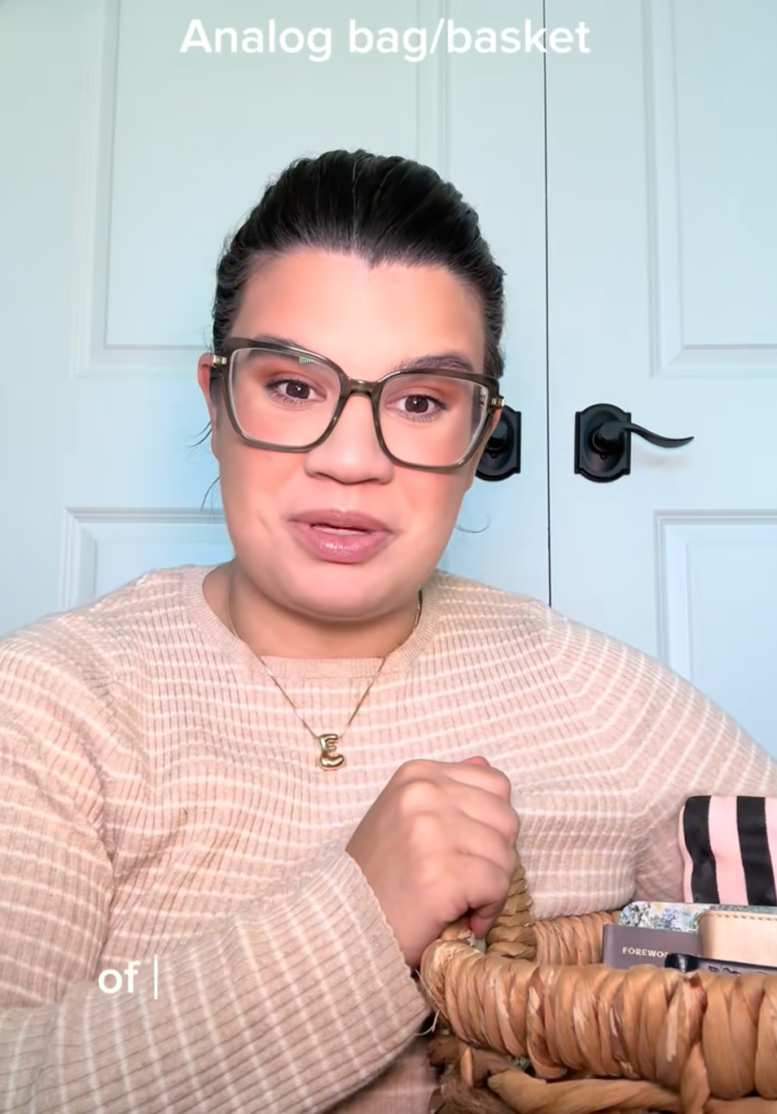 TikTok creator showing off analog bag/basket