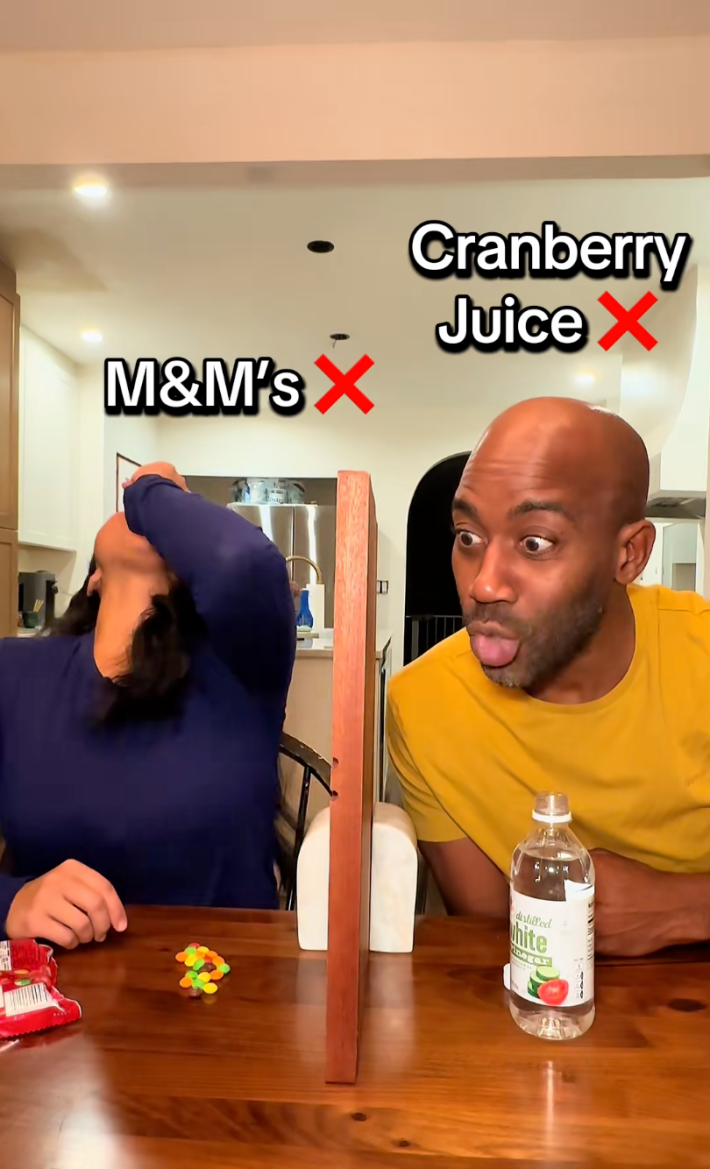 A couple playing the lying challenge. The man looks very confused.