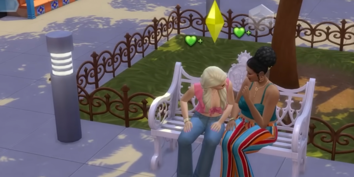 two women sitting on a bench in the sims