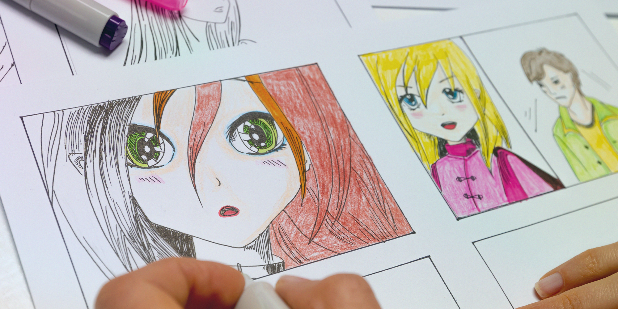 person drawing anime characters