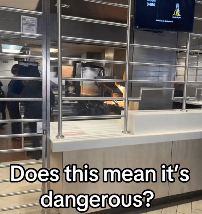 @travel2wealthh/TikTok McDonalds with security bars and onscreen text that reads, "Does this mean it's dangerous?"