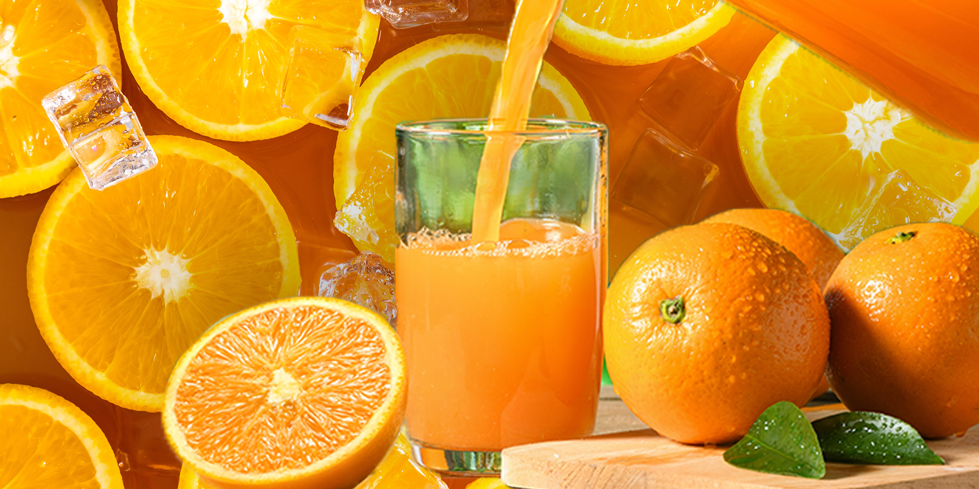 Orange slices and ice cubes with sparkling juice, fresh fruit lemonade with sparkling water and ice cubes, summer lemonade orange drink background. Overlay of a glass jug pouring orange juice into a glass on a wooden table.