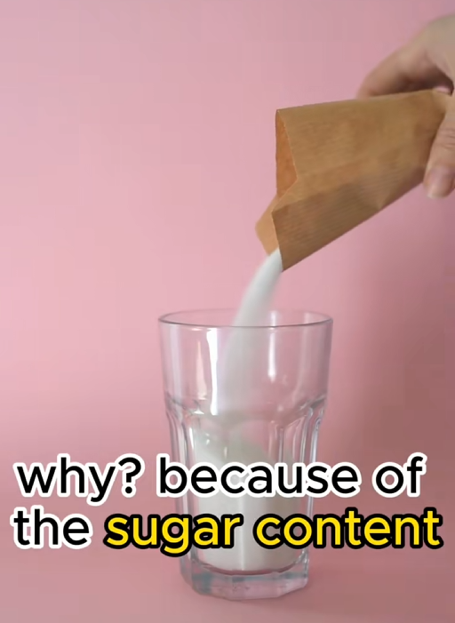 TikTok video graphic showing someone pouring sugar into a class with a caption reading "why? because of the sugar content."