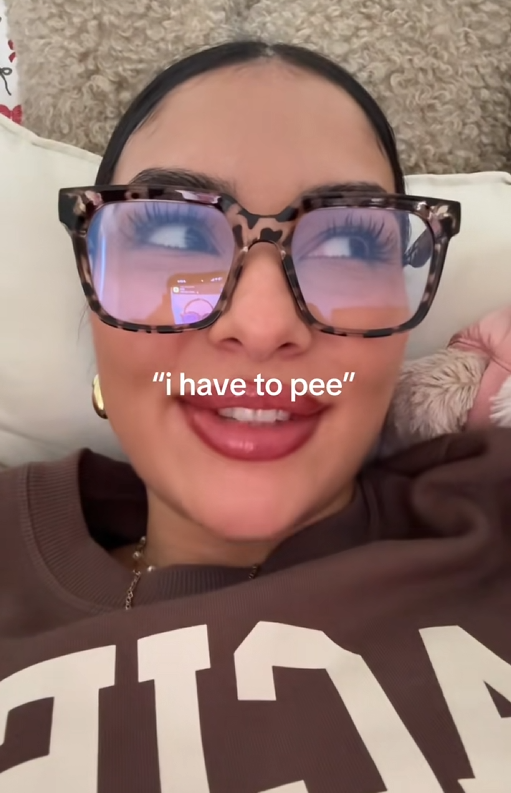 "Come on Superman, say your stupid line" TikTok trend video with a woman saying "i have to pee."