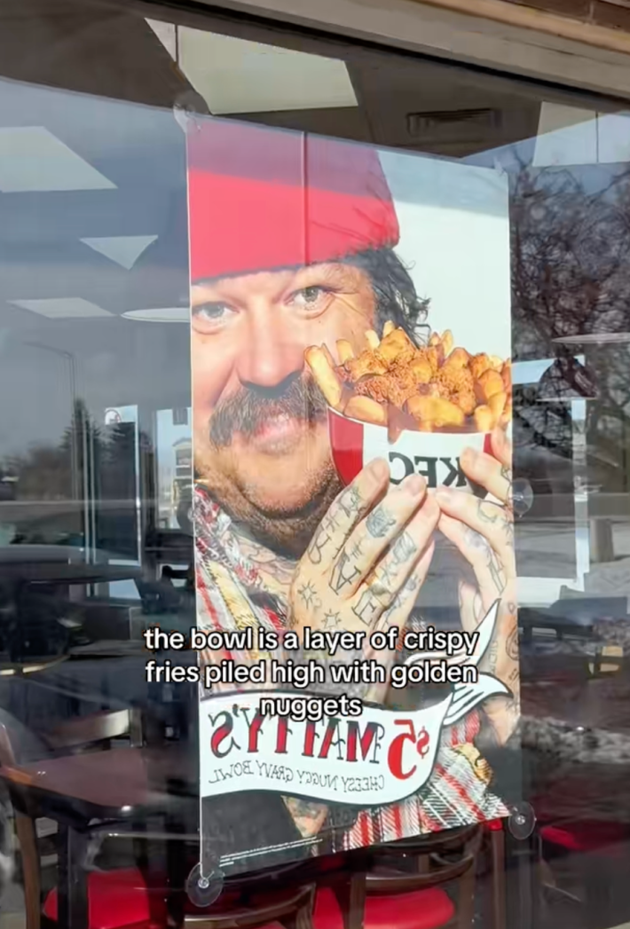 @eatsbynat/TikTok "the bowl is a layer of crispy fired piled high with golden nuggets" Image of Matty Matheson holding up KFC's poutine bowl