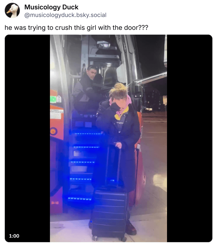 BlueSky post that reads, "he was trying to crush this girl with the door???" with a screenshot of a crying woman with her suitcase standing next to the open bus doors. The driver is visibly annoyed sitting in his seat behind the wheel.