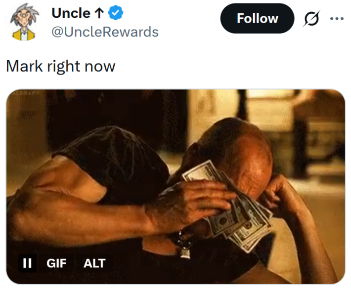 Tweet reading "Mark right now" above a gif of a man wiping his eyes with cash.