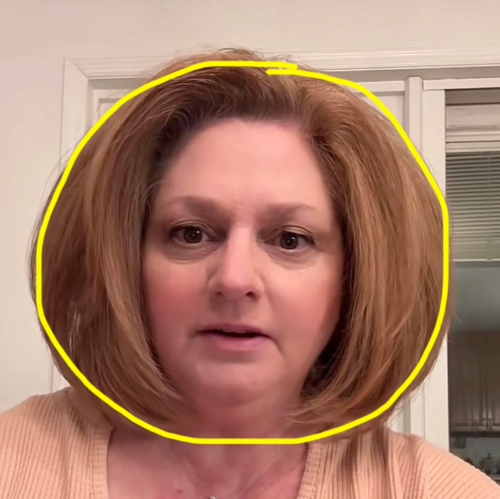 Janet Marie with a circle drawn around her bob