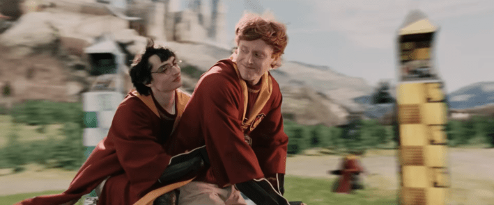 SNL spoof with Harry and Ron on the same broom in a Quidditch match, looking longingly at one another.