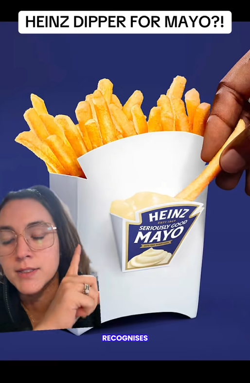 TikTok video of a woman pointing to a white fry box with a caption reading "HEINZ DIPPER FOR MAYO?!"