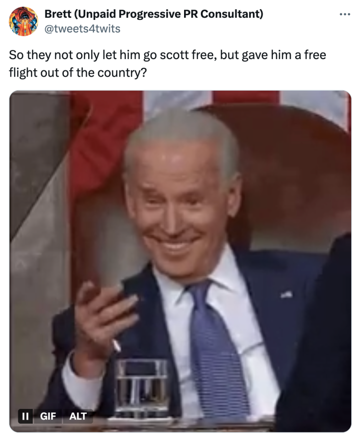Tweet that reads, "So they not only let him go scott free, but gave him a free flight out of the country?" with a GIF of Biden grinning widely and pointing at someone off-camera.