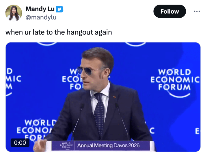 Tweet that reads, "when ur late to the hangout again" with a video of Macron giving a speech at the World Economic Forum.