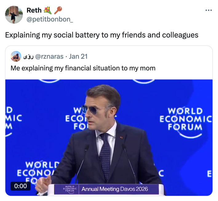 Tweet that reads, "Explaining my social battery to my friends and colleagues" with a video of Macron giving a speech at the World Economic Forum.