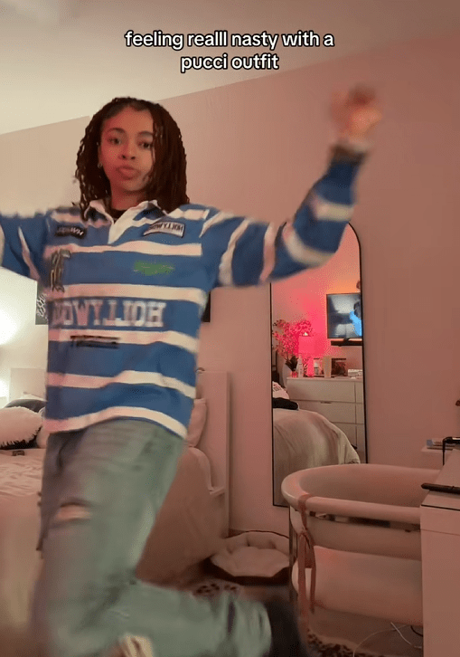 TikTok video of a woman showing off an outfit with the caption "feeling realll nasty with a pucci outfit"