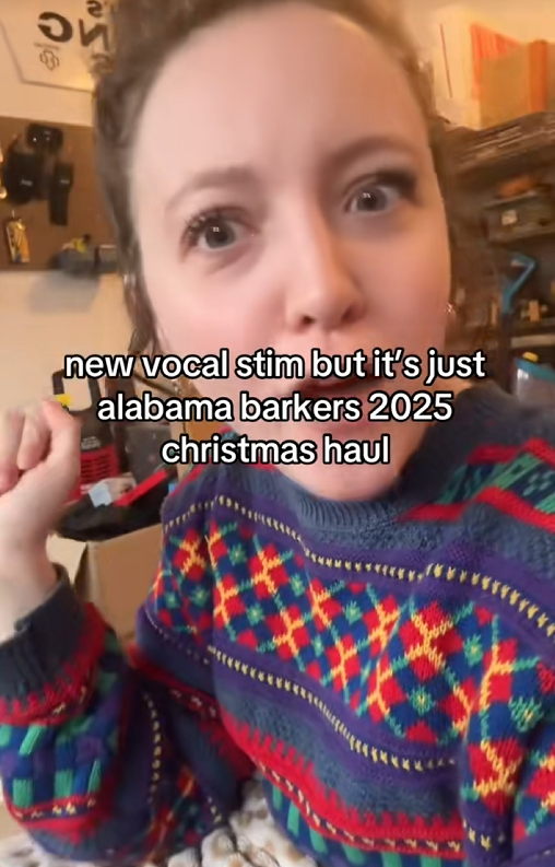 TikTok video of a woman speaking to the camera with a caption reading "new vocal stim but it's just alabama barkers 2025 christmas haul"