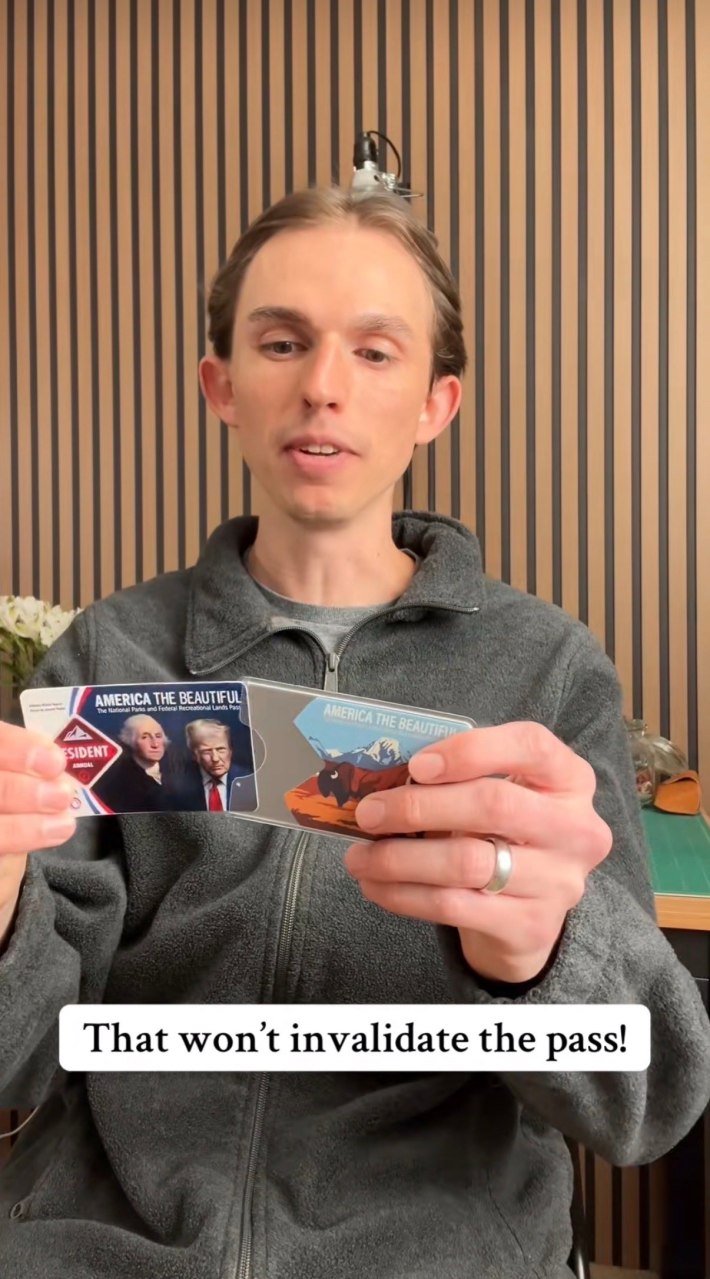A man sitting in front of a striped background, holding an America the Beautiful pass and a sleeve he designed. Text reads, "That won't invalidate the pass!"