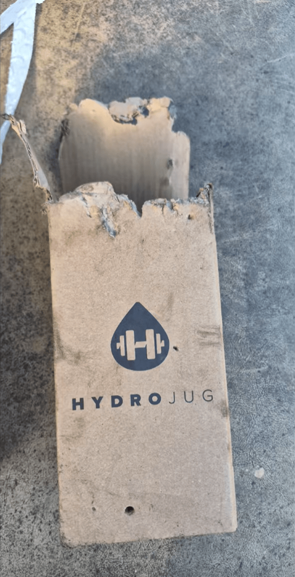 Footage of a chewed-on HydroJug package.