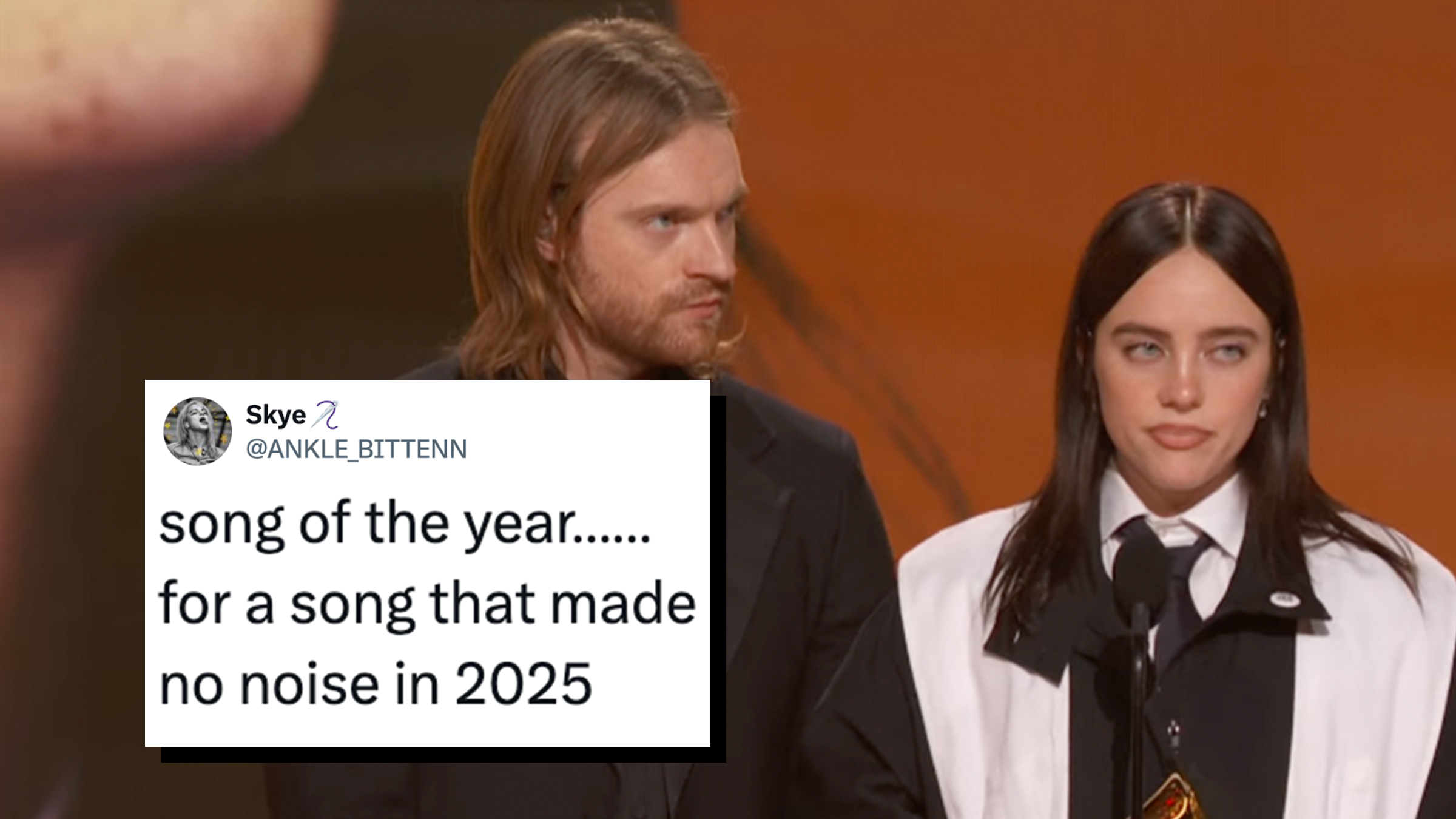 BILLIE EILISH & FINNEAS O'CONNELL deliver an acceptance speech after winning the GRAMMY for SONG OF THE YEAR for "WILDFLOWER" at the 2026 GRAMMYs. Tweet text overlay reads, "song of the year…… for a song that made no noise in 2025."