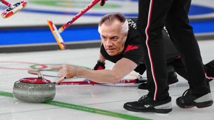 Paulie Gualtieri from The Sopranos touching the curling stone.