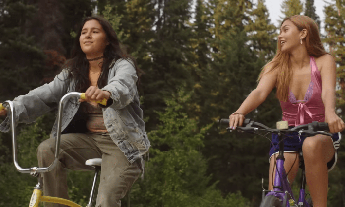 two girls riding bikes