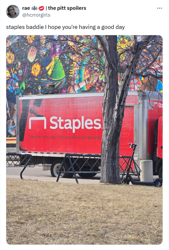 Tweet that reads, "staples baddie I hope you're having a good day" with a photo of a Staples delivery truck.