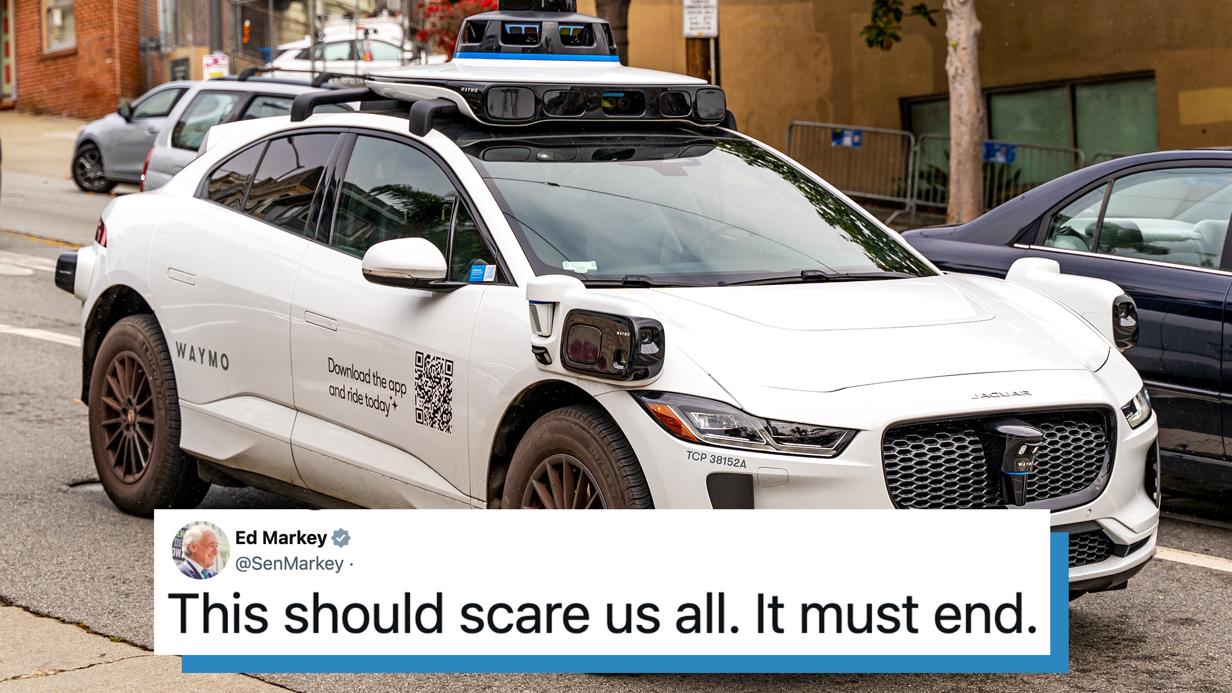 Waymo self-driving car operating on city streets in San Francisco. Tweet text overlay from Massachusetts Senator Ed Markey reads, "This should scare us all. It must end."