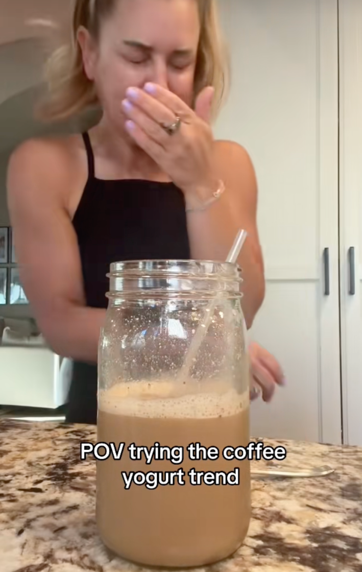 @janellerohner/TikTok woman retching "POV trying the coffee yogurt trend"